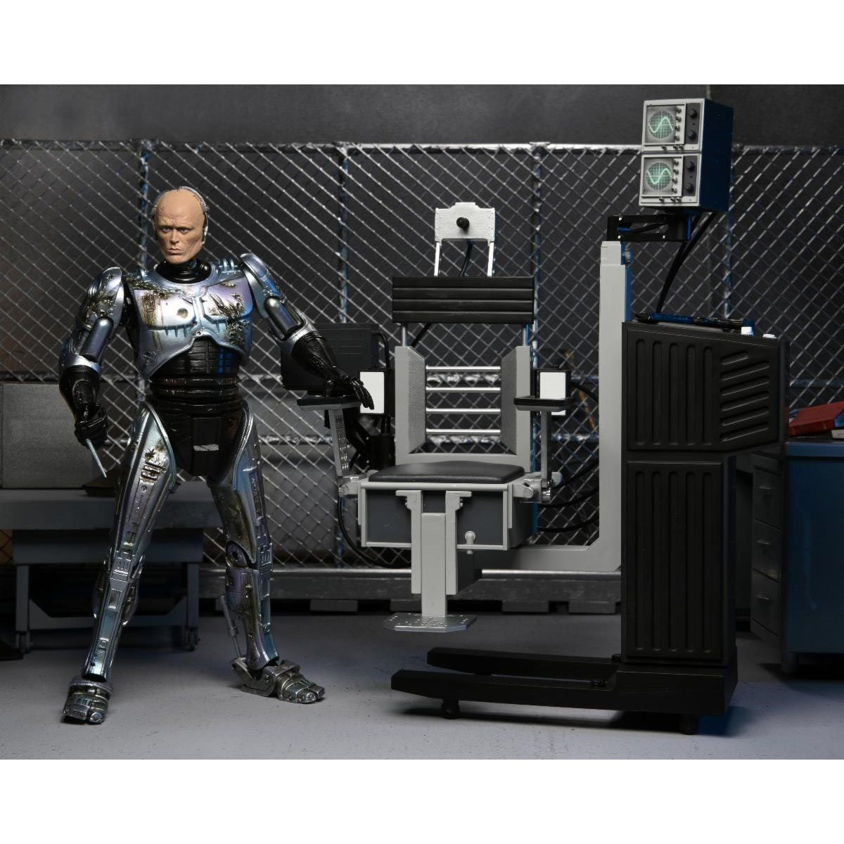 RoboCop Ultimate Battle-Damaged RoboCop with Chair 7-Inch Scale Action Figure