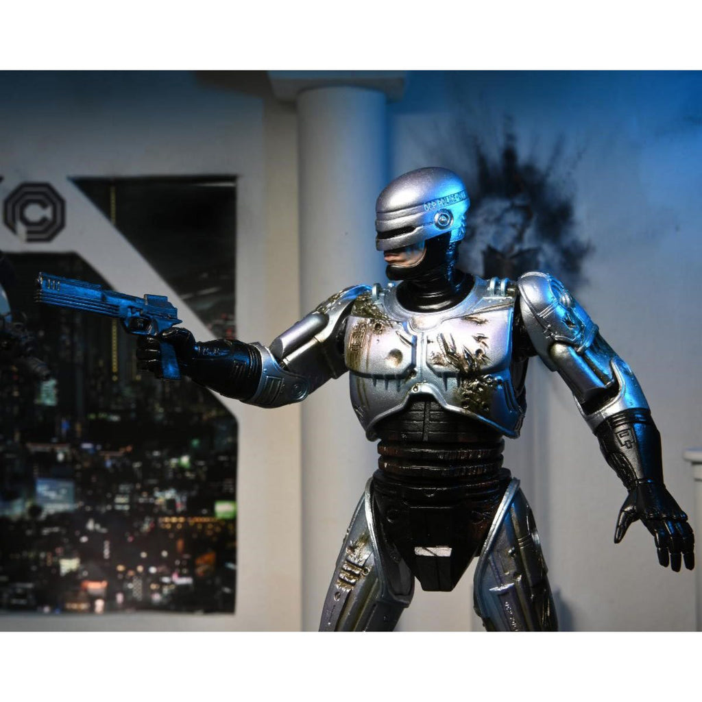 RoboCop Ultimate Battle-Damaged RoboCop with Chair 7-Inch Scale Action Figure