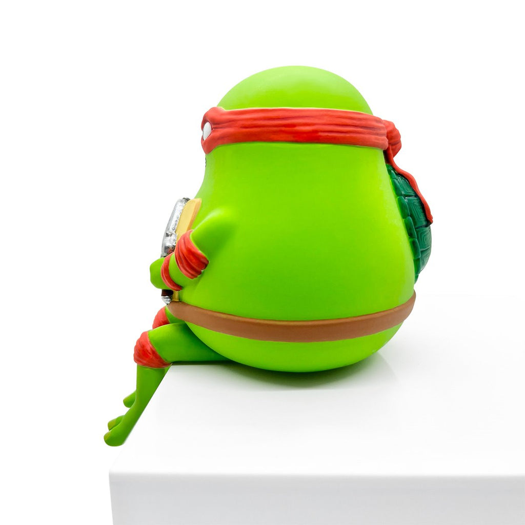Teenage Mutant Ninja Turtles Sad Salesman Raph Sitting Vinyl Figure