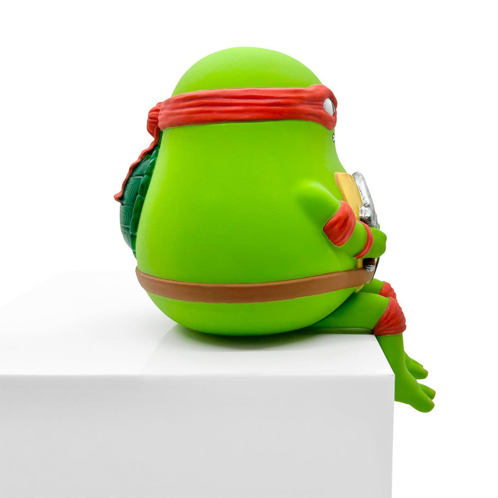 Teenage Mutant Ninja Turtles Sad Salesman Raph Sitting Vinyl Figure